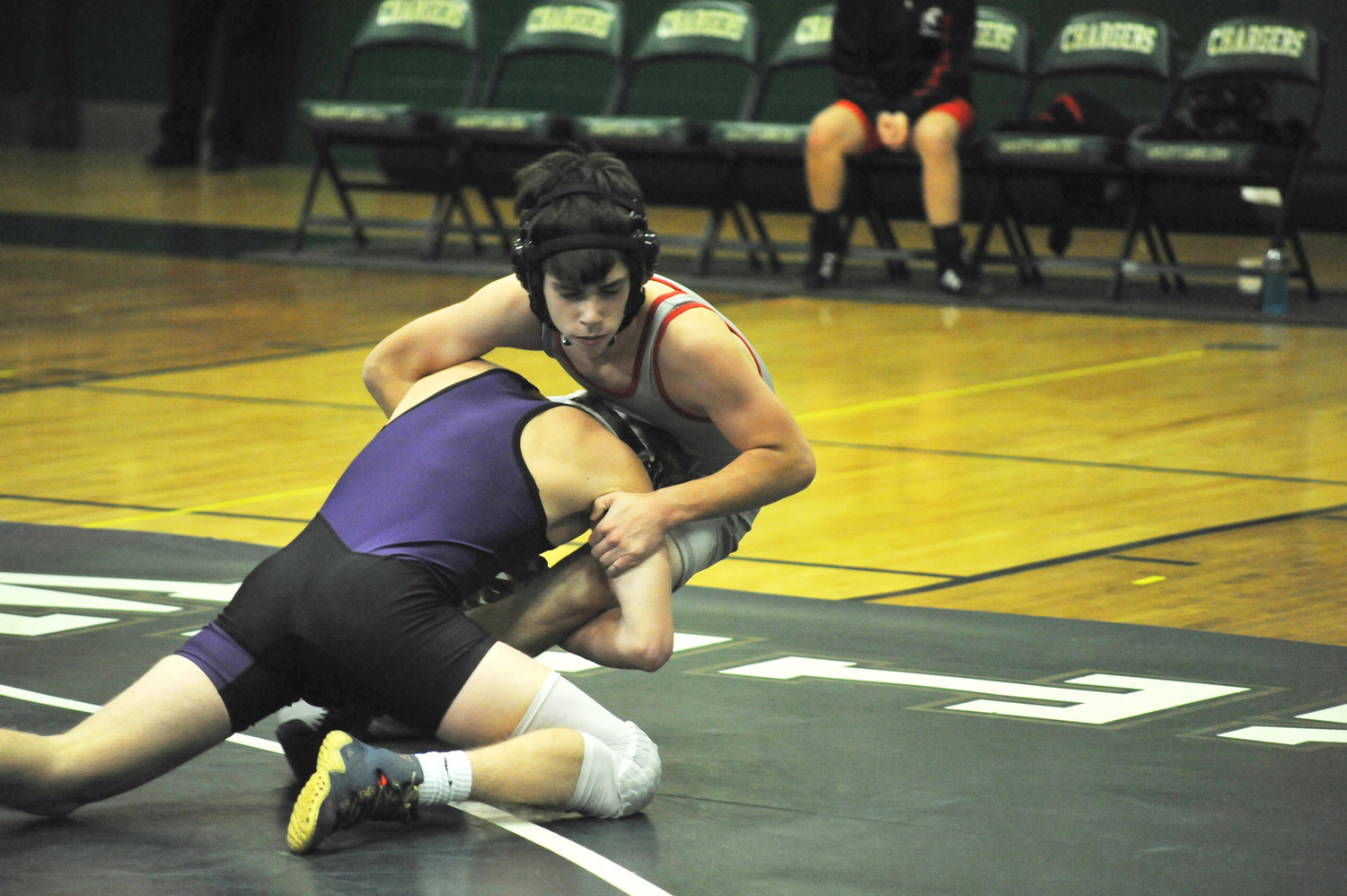 In the Battle of Chatham County Wrestling event at Northwood High in Pittsboro in 2019, Chatham Charter’s Chandler Steel takes down Chatham Central’s Hunter Bray in competition. Steel’s pin of Bray stopped the match with an automatic win.